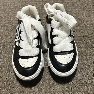 Black and white Naked Wolfe platform sneakers